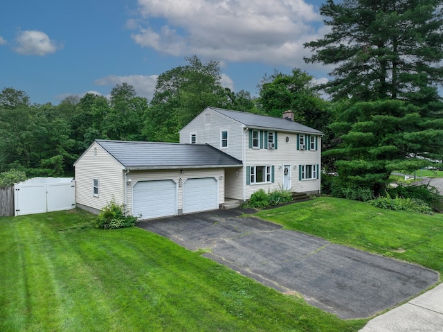 17 Plainfield St, Enfield, CT 06082 - colonial house featuring driveway, an attached garage, a gate, and a chimney