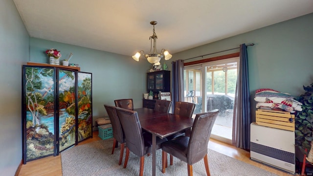 17 Plainfield St, Enfield, CT 06082 - dining area with light wood-style floors and a chandelier