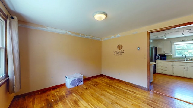 17 Plainfield St, Enfield, CT 06082 - spare room with light wood finished floors and a sink