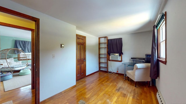17 Plainfield St, Enfield, CT 06082 - sitting room featuring light wood-type flooring and baseboard heating
