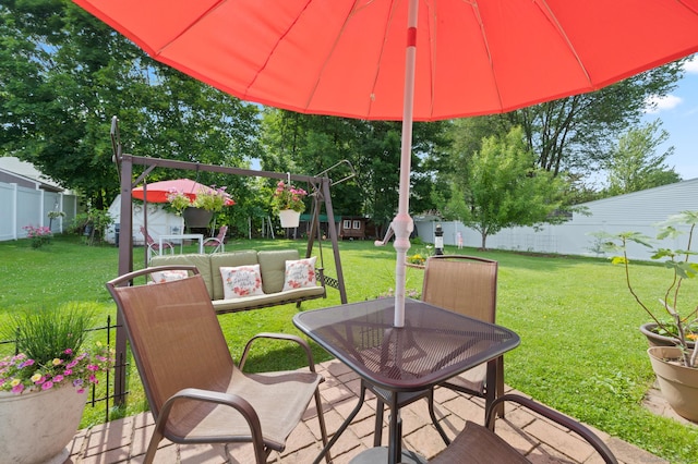 529 Orchard St, Rocky Hill, CT 06067 - fenced backyard with outdoor dining area and a playground