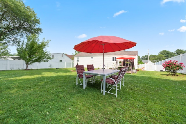 529 Orchard St, Rocky Hill, CT 06067 - fenced backyard featuring outdoor dining space