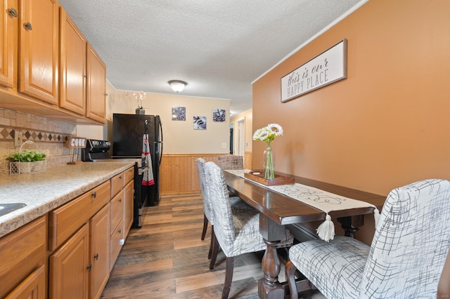 529 Orchard St, Rocky Hill, CT 06067 - dining room with a textured ceiling, a wainscoted wall, dark wood-style floors, and wooden walls