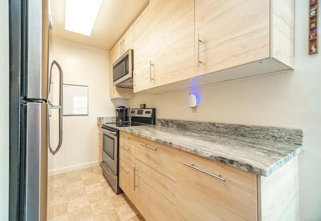 3 France St Unit B, Norwalk, CT 06851 - kitchen featuring stainless steel appliances, light brown cabinets, and modern cabinets
