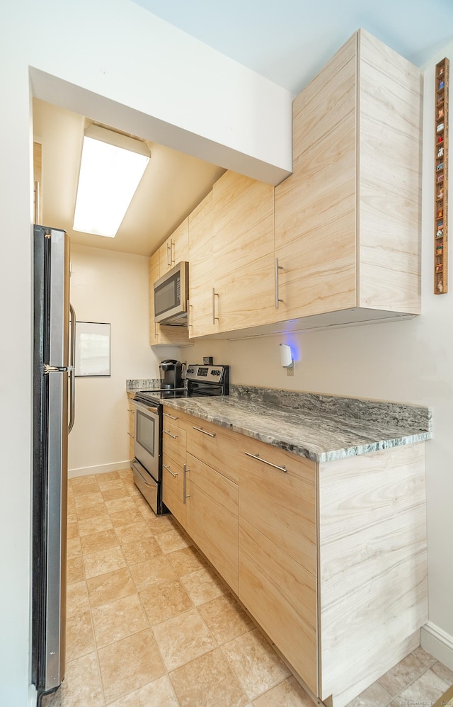 3 France St Unit B, Norwalk, CT 06851 - kitchen with stainless steel appliances and light brown cabinets