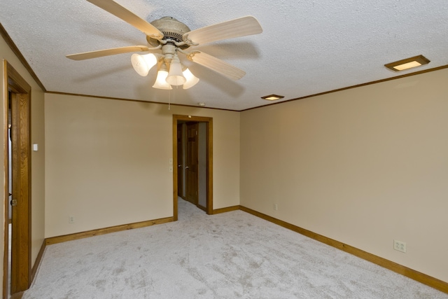 317 Turnpike Rd, Somers, CT 06071 - unfurnished room with light carpet, ceiling fan, a textured ceiling, and ornamental molding