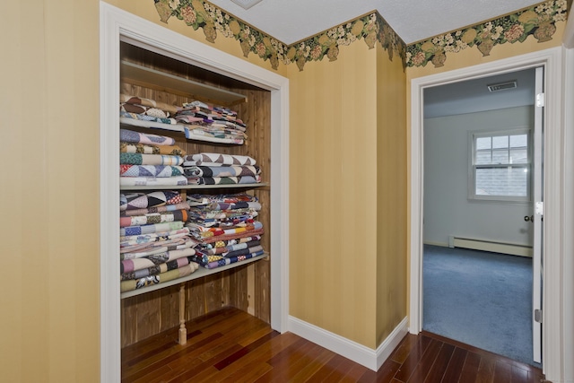 317 Turnpike Rd, Somers, CT 06071 - closet featuring a baseboard radiator