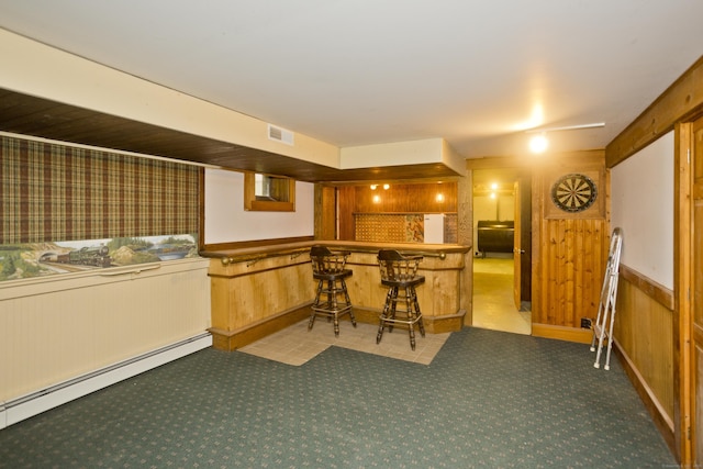 317 Turnpike Rd, Somers, CT 06071 - indoor bar with a baseboard heating unit, wood walls, and carpet