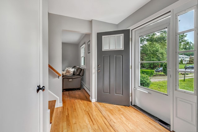 343 Steiner St, Fairfield, CT 06825 - entryway with a baseboard radiator and light wood-style floors