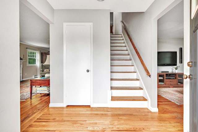 343 Steiner St, Fairfield, CT 06825 - staircase with wood finished floors and baseboards