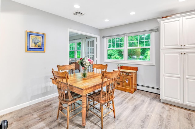 343 Steiner St, Fairfield, CT 06825 - dining space with a baseboard radiator, light wood-type flooring, and recessed lighting