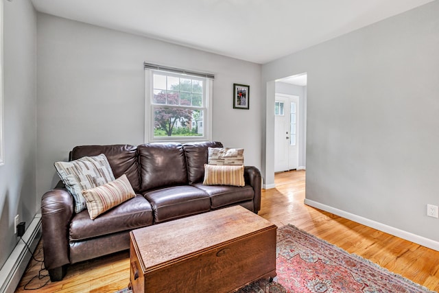 343 Steiner St, Fairfield, CT 06825 - living area with a baseboard radiator and light wood-type flooring