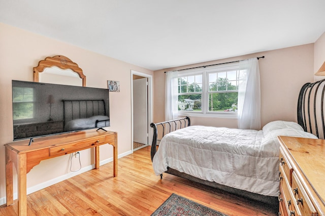 343 Steiner St, Fairfield, CT 06825 - bedroom with light wood-style floors and baseboards
