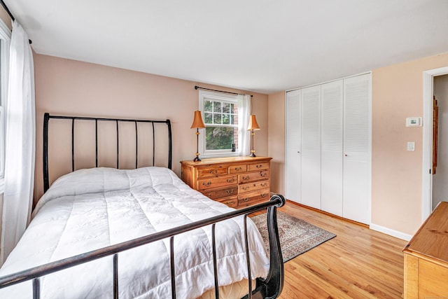 343 Steiner St, Fairfield, CT 06825 - bedroom with light wood-style floors and a closet