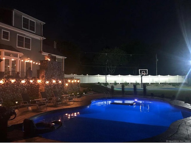 1 Far Horizon Dr, Wallingford, CT 06492 - pool at twilight featuring a patio area