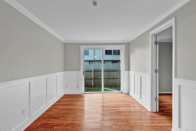 189 High Top Cir W Unit 189, Hamden, CT 06514 - spare room featuring ornamental molding, a smoke detector, wood finished floors, a wainscoted wall, and a decorative wall