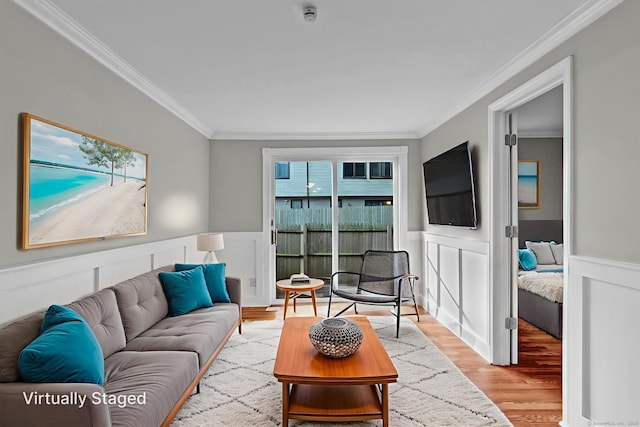 189 High Top Cir W Unit 189, Hamden, CT 06514 - living area featuring crown molding, light wood-style floors, plenty of natural light, wainscoting, and a decorative wall