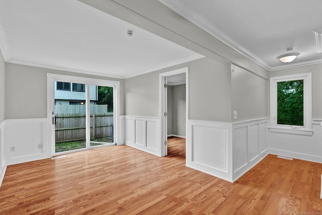 189 High Top Cir W Unit 189, Hamden, CT 06514 - unfurnished room featuring crown molding, light wood finished floors, a wainscoted wall, a smoke detector, and a decorative wall