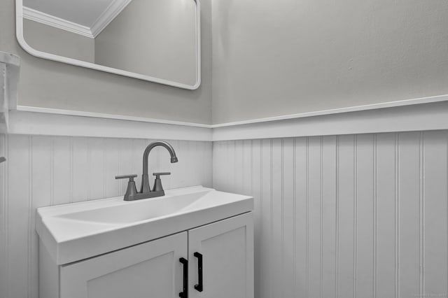 189 High Top Cir W Unit 189, Hamden, CT 06514 - bathroom with ornamental molding, vanity, wainscoting, and a decorative wall