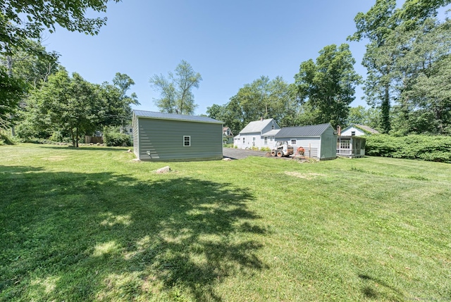 63 Fox Trl, Coventry, CT 06238 - view of grassy yard featuring an outbuilding