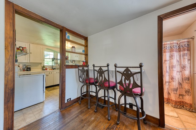 63 Fox Trl, Coventry, CT 06238 - dining room with wood finished floors and washer / dryer