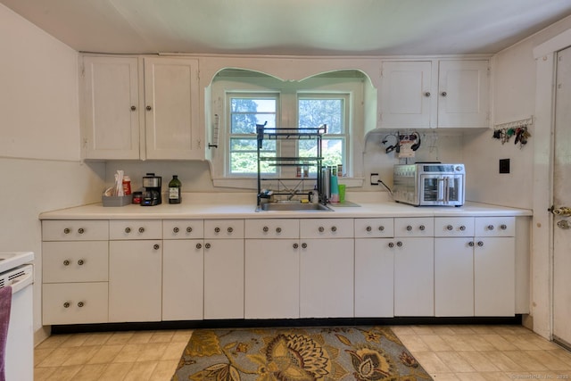 63 Fox Trl, Coventry, CT 06238 - kitchen featuring arched walkways, white cabinets, and light countertops