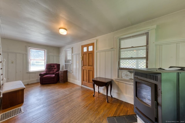 63 Fox Trl, Coventry, CT 06238 - entryway featuring a decorative wall, hardwood / wood-style floors, and a wainscoted wall