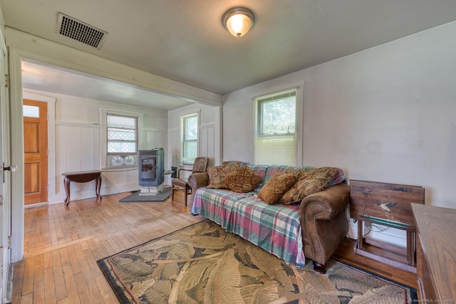 63 Fox Trl, Coventry, CT 06238 - living area with a wood stove and hardwood / wood-style flooring