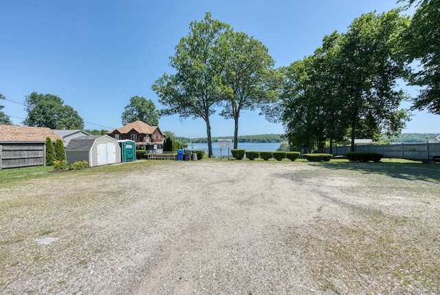 63 Fox Trl, Coventry, CT 06238 - view of yard featuring a storage shed and a water view