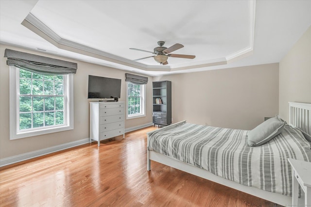 27 Bartlett Ln Unit 27, Shelton, CT 06484 - bedroom with a tray ceiling, wood finished floors, crown molding, and ceiling fan