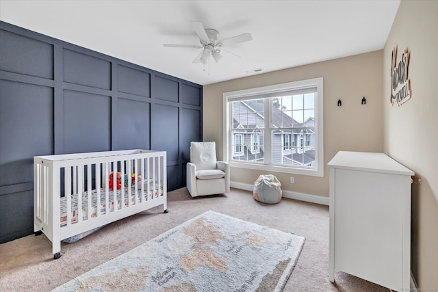 27 Bartlett Ln Unit 27, Shelton, CT 06484 - bedroom with light colored carpet, a crib, and ceiling fan
