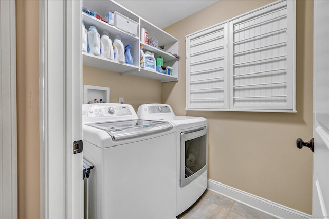 27 Bartlett Ln Unit 27, Shelton, CT 06484 - washroom with washing machine and clothes dryer and tile patterned floors