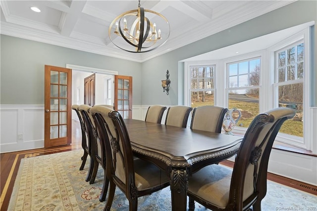 275 Chestnut Grv, Guilford, CT 06437 - dining room with french doors, wood finished floors, coffered ceiling, a chandelier, and beam ceiling