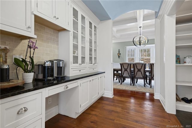275 Chestnut Grv, Guilford, CT 06437 - kitchen featuring coffered ceiling, tasteful backsplash, glass insert cabinets, white cabinetry, and dark wood-style flooring