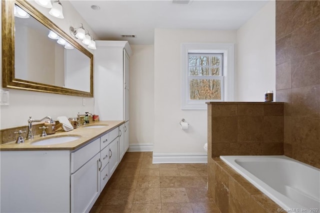 275 Chestnut Grv, Guilford, CT 06437 - full bathroom with double vanity and a garden tub