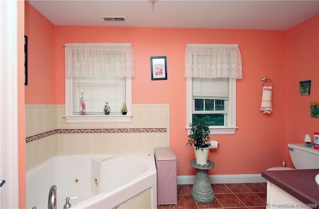 109 Davis Rd, Seymour, CT 06483 - full bath featuring a whirlpool tub, tile patterned flooring, and vanity