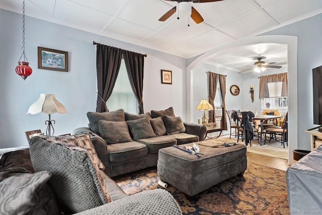 114 Prospect St, Norwich, CT 06360 - living area with ceiling fan, wood finished floors, crown molding, and arched walkways