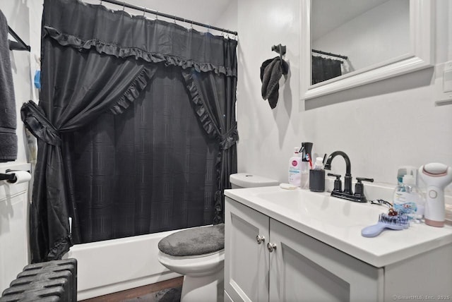 114 Prospect St, Norwich, CT 06360 - full bath with radiator heating unit, vanity, shower / bath combination with curtain, and wood finished floors