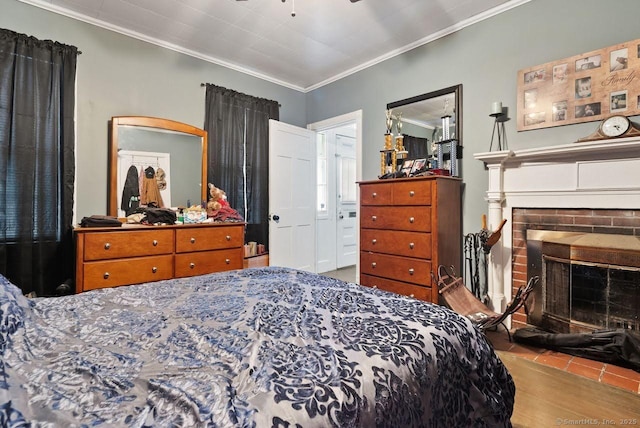 114 Prospect St, Norwich, CT 06360 - bedroom featuring crown molding and a brick fireplace