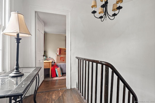 114 Prospect St, Norwich, CT 06360 - hallway with dark wood-type flooring and a chandelier