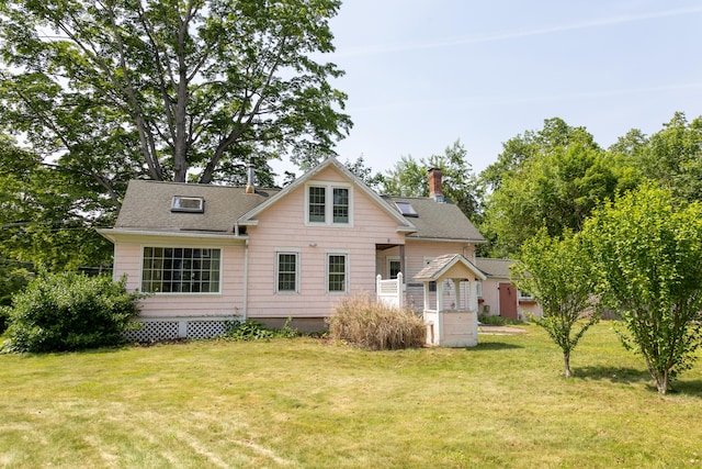 114 Spring St, Cheshire, CT 06410 - view of front of house with a chimney, a front lawn, and roof with shingles