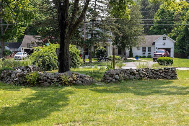 114 Spring St, Cheshire, CT 06410 - view of green lawn featuring a garage