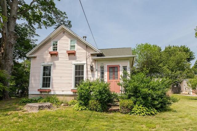 114 Spring St, Cheshire, CT 06410 - view of front of home featuring a front lawn and roof with shingles