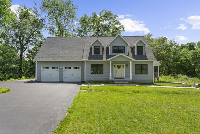 2 Sabrinas Ct, Norwich, CT 06360 - view of front of property with a garage, asphalt driveway, a front yard, and roof with shingles