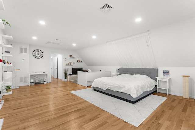 2 Sabrinas Ct, Norwich, CT 06360 - bedroom with light wood-style floors, recessed lighting, and lofted ceiling