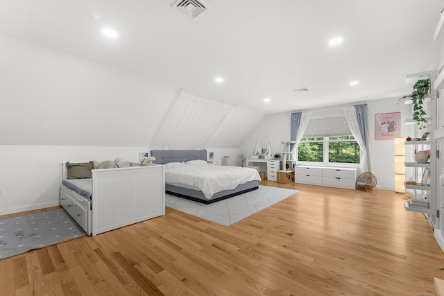 2 Sabrinas Ct, Norwich, CT 06360 - bedroom with light wood-style flooring, vaulted ceiling, and recessed lighting