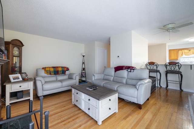 560 Yale Ave Unit 124, Meriden, CT 06450 - living area with light wood-type flooring and a ceiling fan