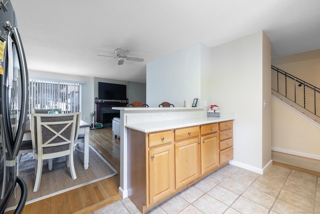 560 Yale Ave Unit 124, Meriden, CT 06450 - kitchen with refrigerator, a ceiling fan, light countertops, a peninsula, and open floor plan