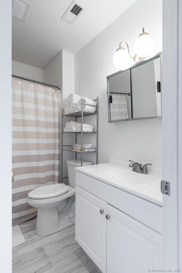 560 Yale Ave Unit 124, Meriden, CT 06450 - bathroom with vanity and a textured ceiling