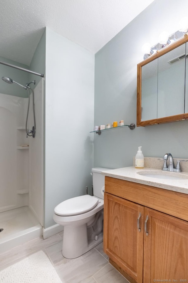 560 Yale Ave Unit 124, Meriden, CT 06450 - bathroom featuring a walk in shower and vanity
